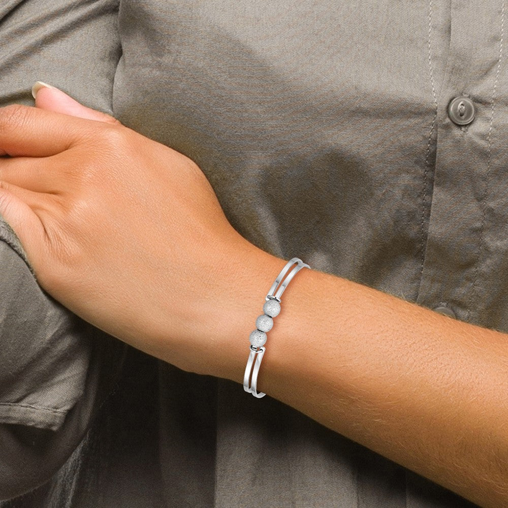 SS Radiant Essence Polish/Textured Beads Flexible Bangle